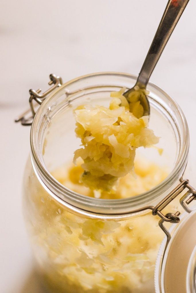 a forkful of mason jar sauerkraut