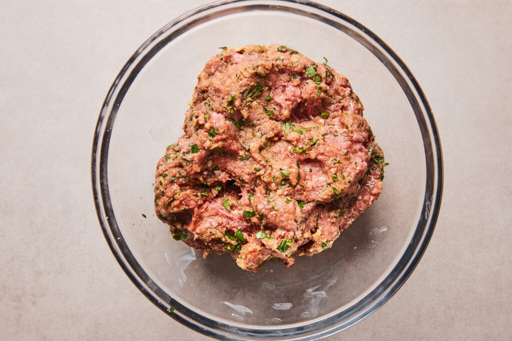 Meatball ingredients mixed in bowl.