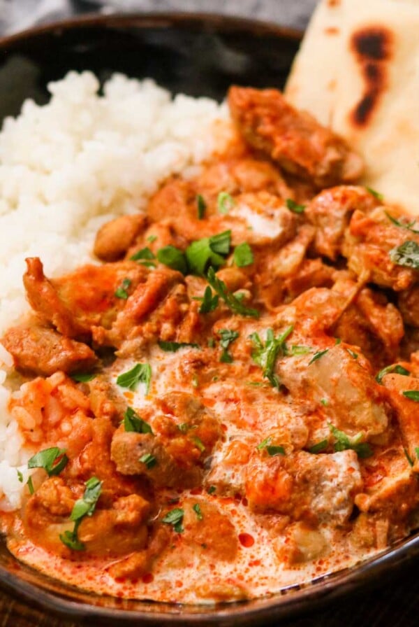 Instant Pot Butter Chicken served with rice and naan