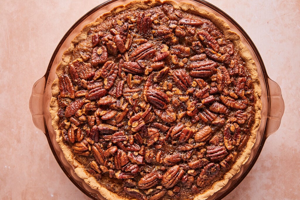 Freshly baked pumpkin pecan pie with a golden crust