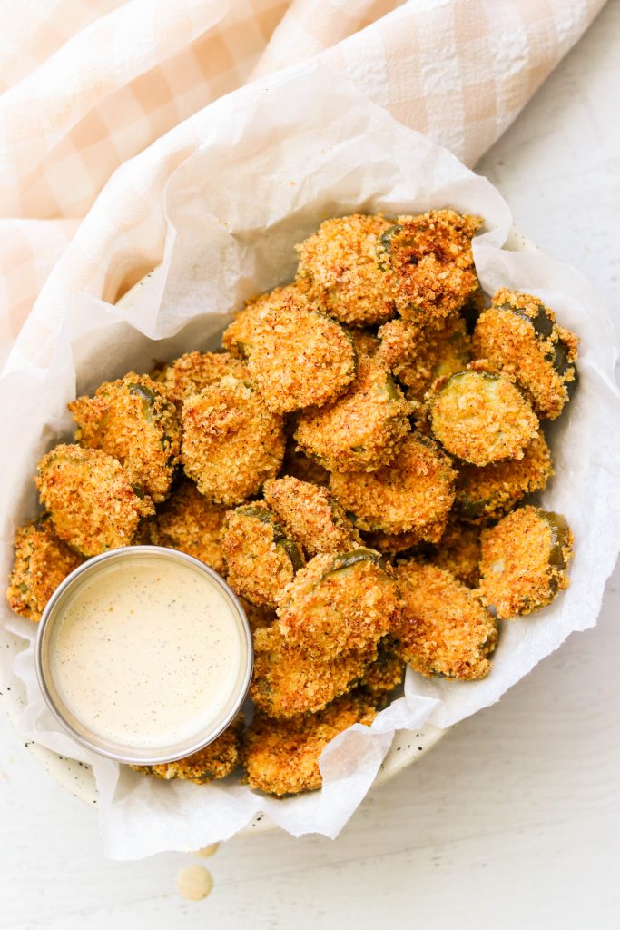 Keto Air Fryer Fried Pickles on a plate with a side of ranch