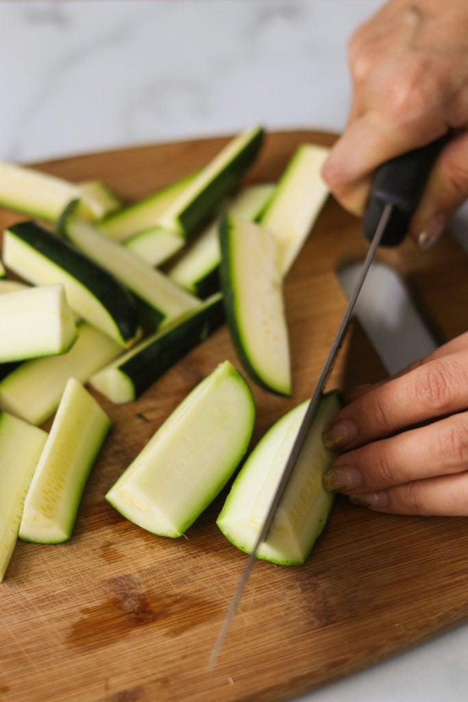 Cutting up for zucchini for a gluten free zucchini side dish