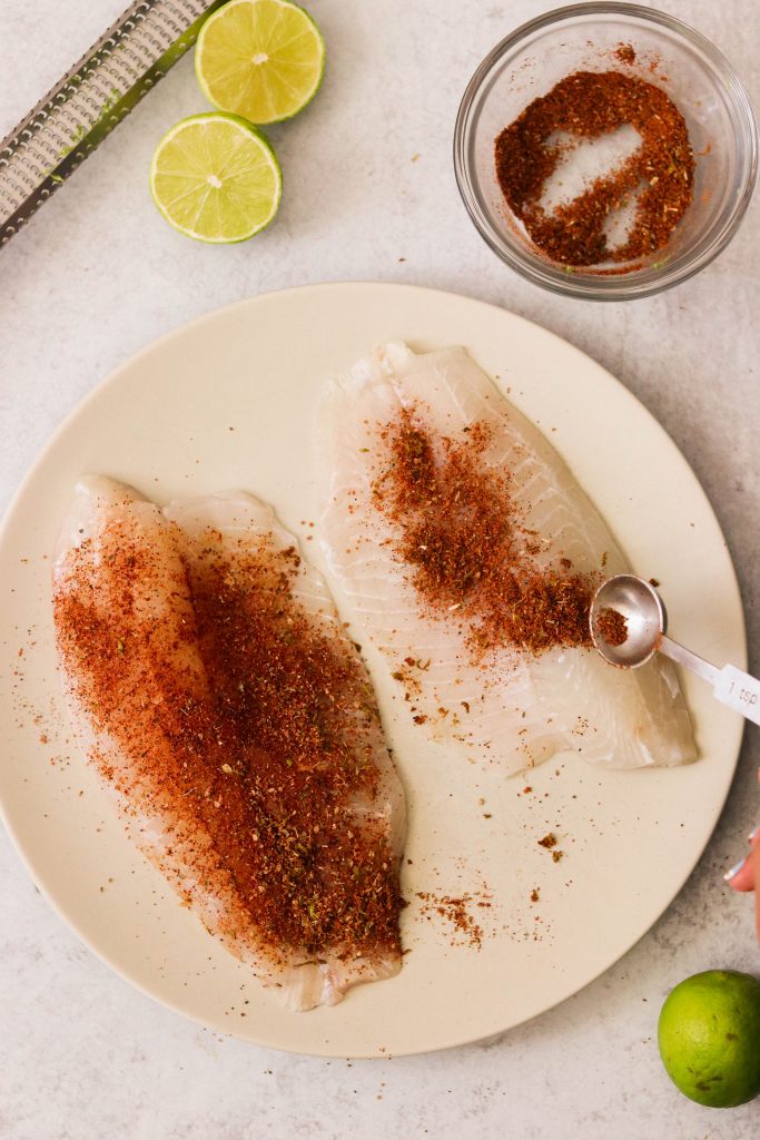 coating air fryer tilapia with chili lime seasoning