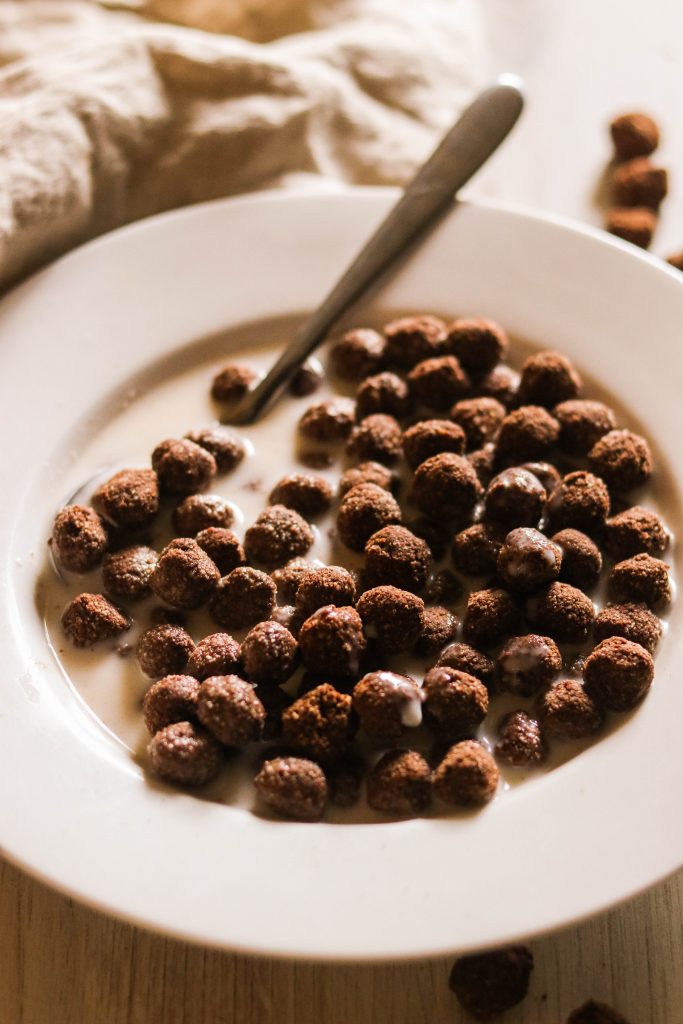 close up angle of paleo chocolate cereal with milk