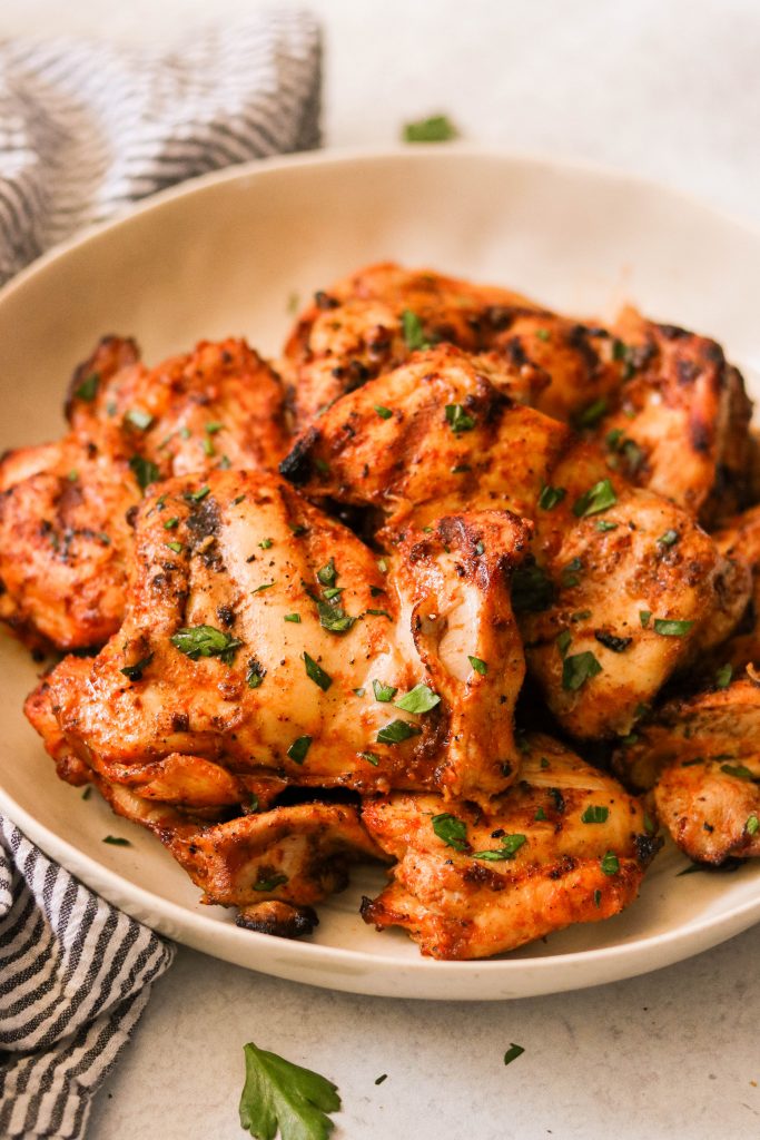 perfect grilled chicken thighs on a plate