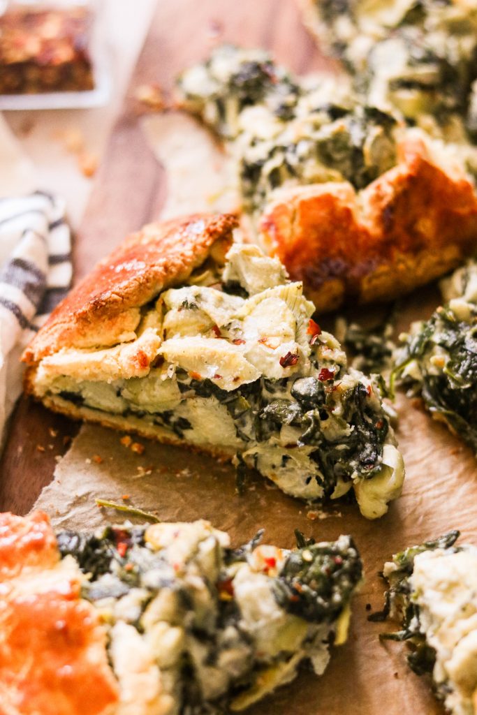 close up of gluten free paleo spinach and artichoke galette