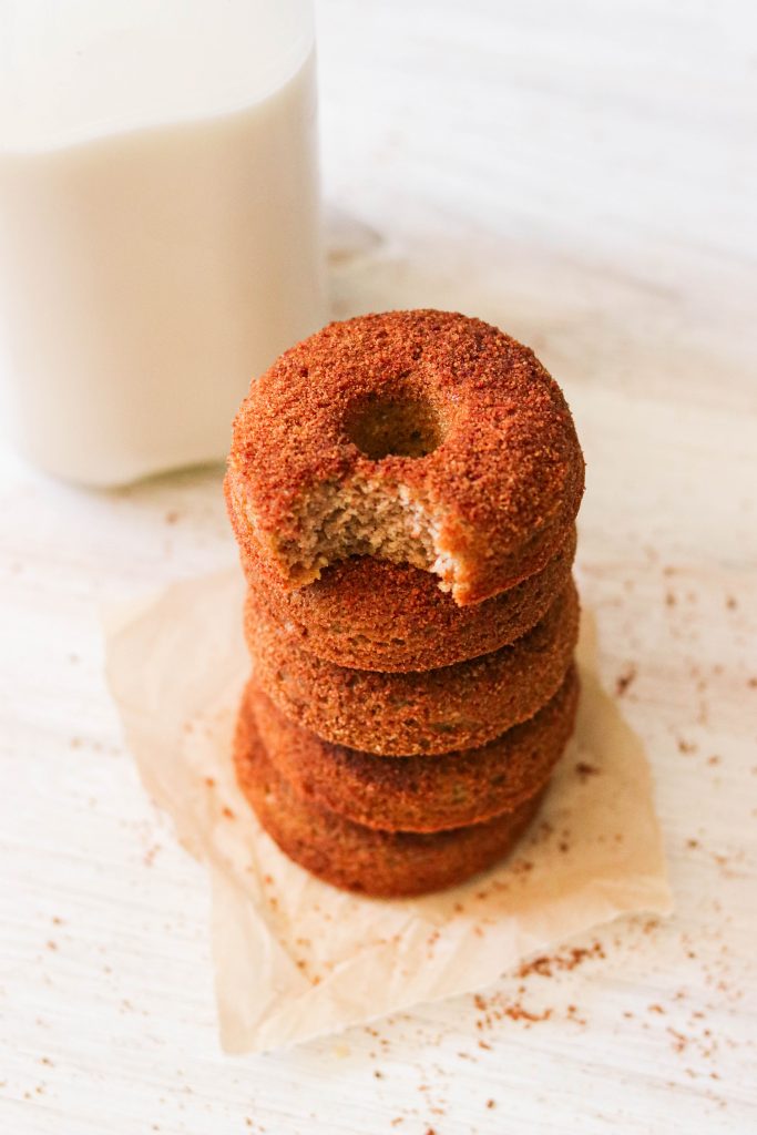 churro donuts with a bite taken out