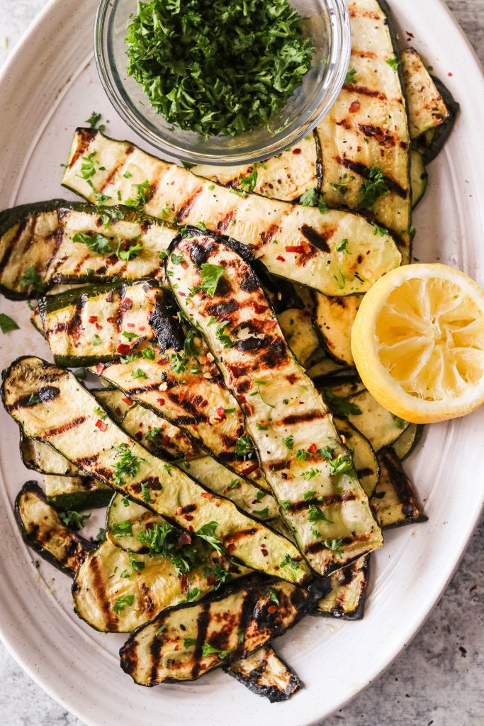 zucchini squash with grill marks on a platter