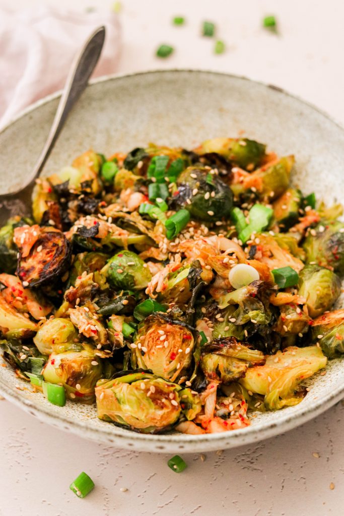 roasted brussels sprouts and kimchi in a bowl