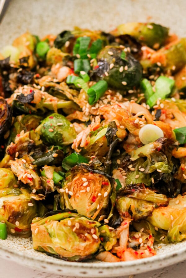 kimchi brussels sprouts served in a bowl