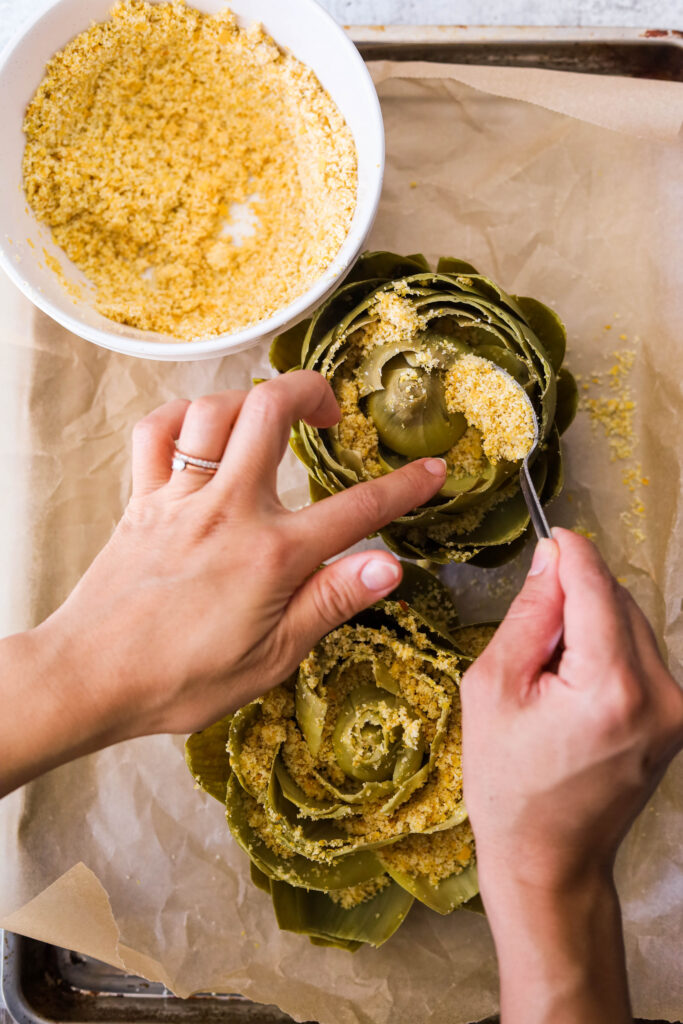 stuffing boiled artichokes with stuffing