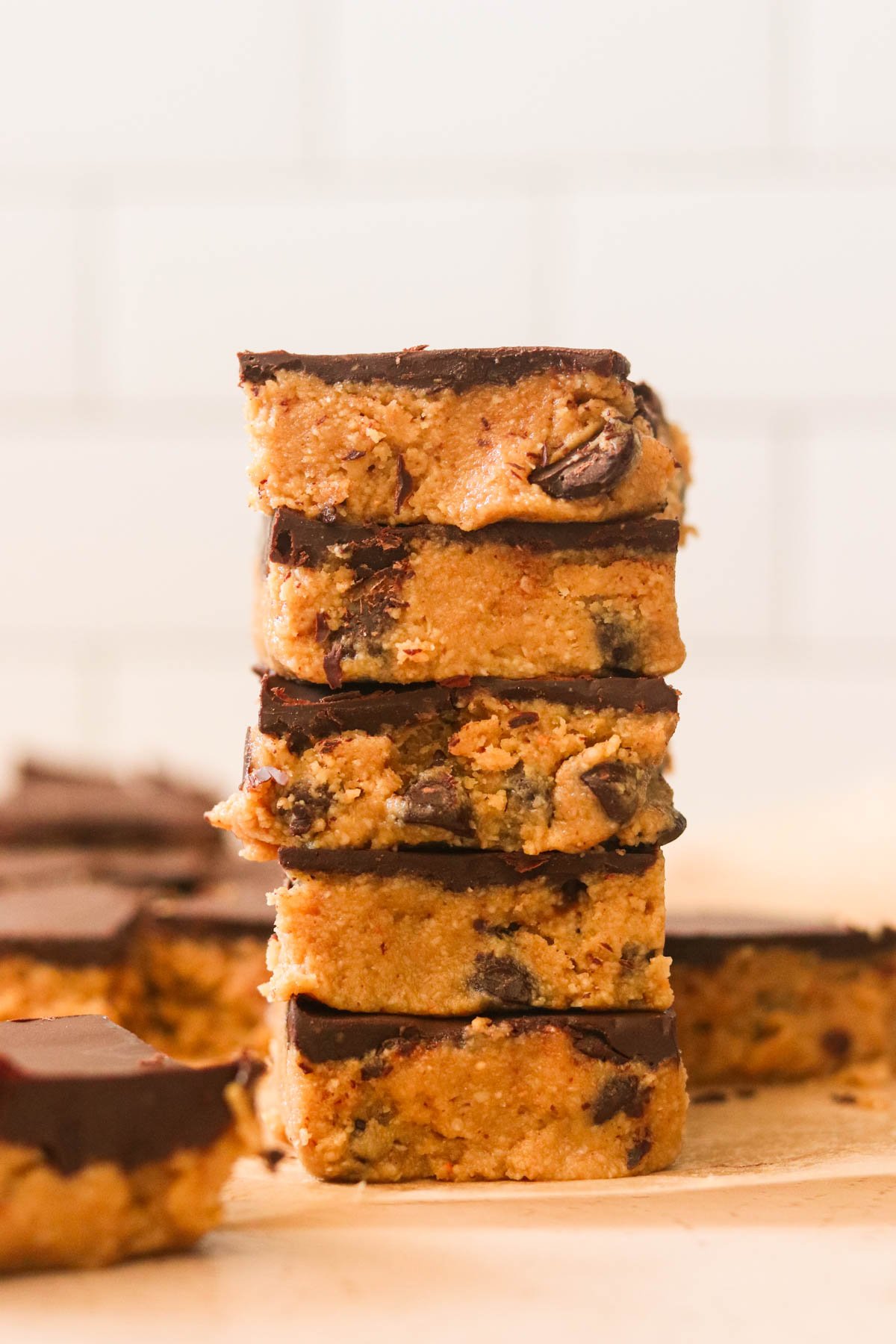 No bake chocolate peanut butter bars stacked on top of each other