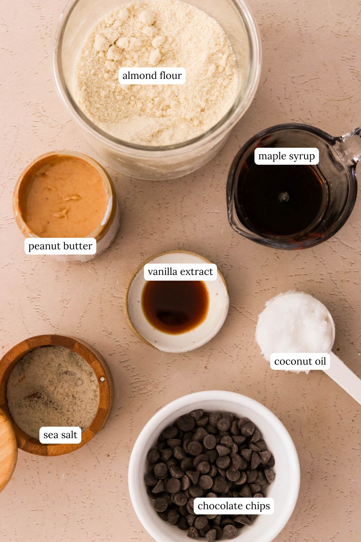Ingredients for chocolate peanut butter bars in bowls 