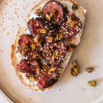 caramelized figs on toast with goat cheese and sesame seeds
