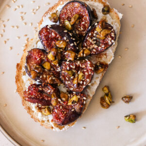 caramelized figs on toast with goat cheese and sesame seeds