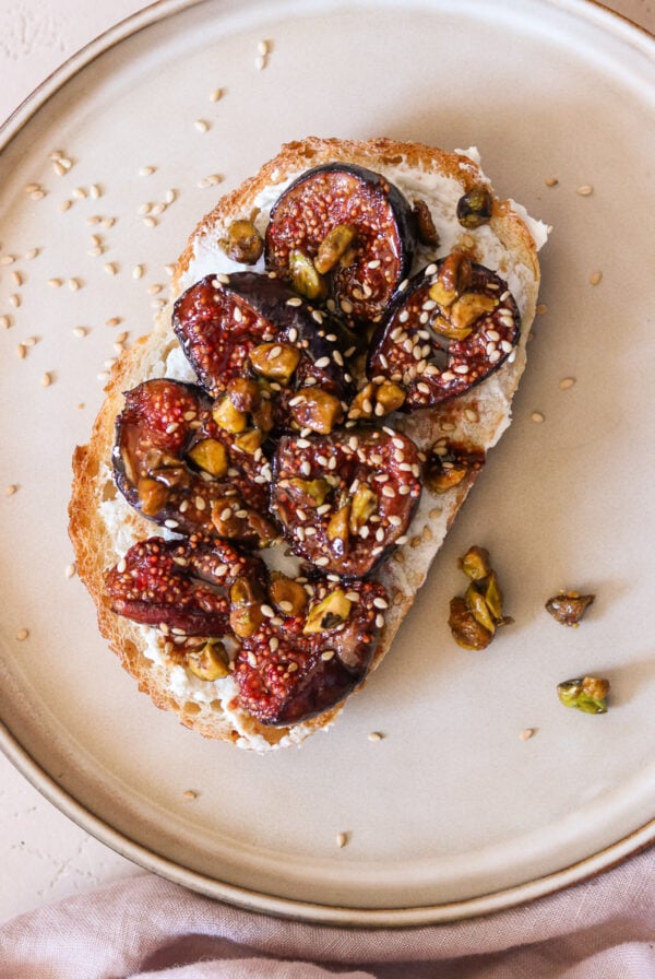 caramelized figs on toast with goat cheese and sesame seeds