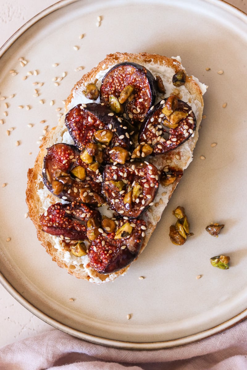 caramelized figs on toast with goat cheese and sesame seeds