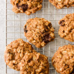 baked vegan oatmeal cookies on a wire cooling rack