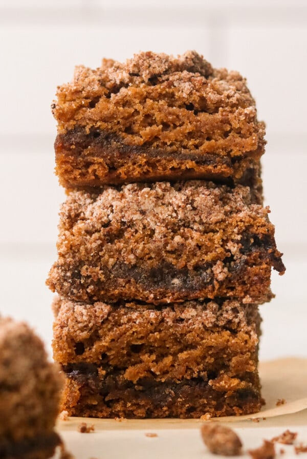 three slices of vegan coffee cake stacked on top of each other