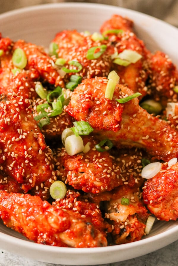 a bowl of air fryer korean fried chicken wings.