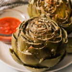 roasted stuffed artichokes served with marinara sauce