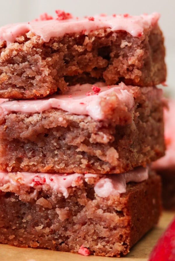 three strawberry brownies stacked on top of each other