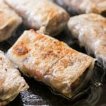 fried rice paper dumplings with a black background