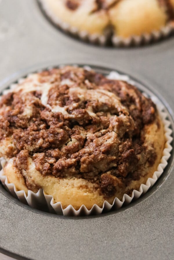a photo of a nutella muffin baking in a muffin tin