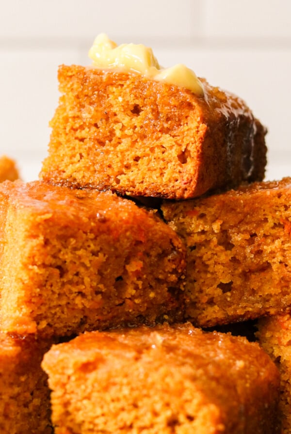 squares of sweet potato cornbread stacked on top of each other