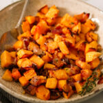 air fryer butternut squash in a white bowl