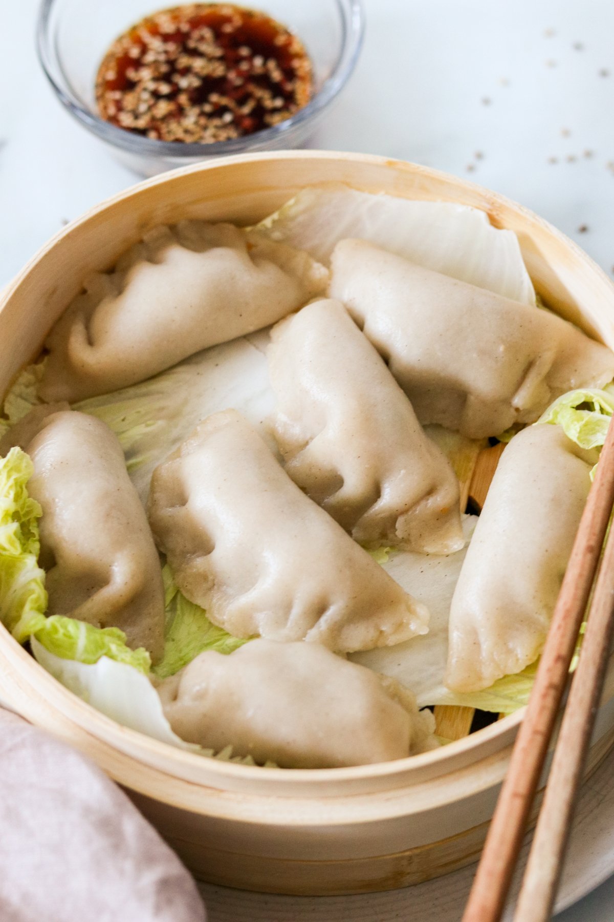 gluten free korean dumplings (mandu) cooked in a steamer basket