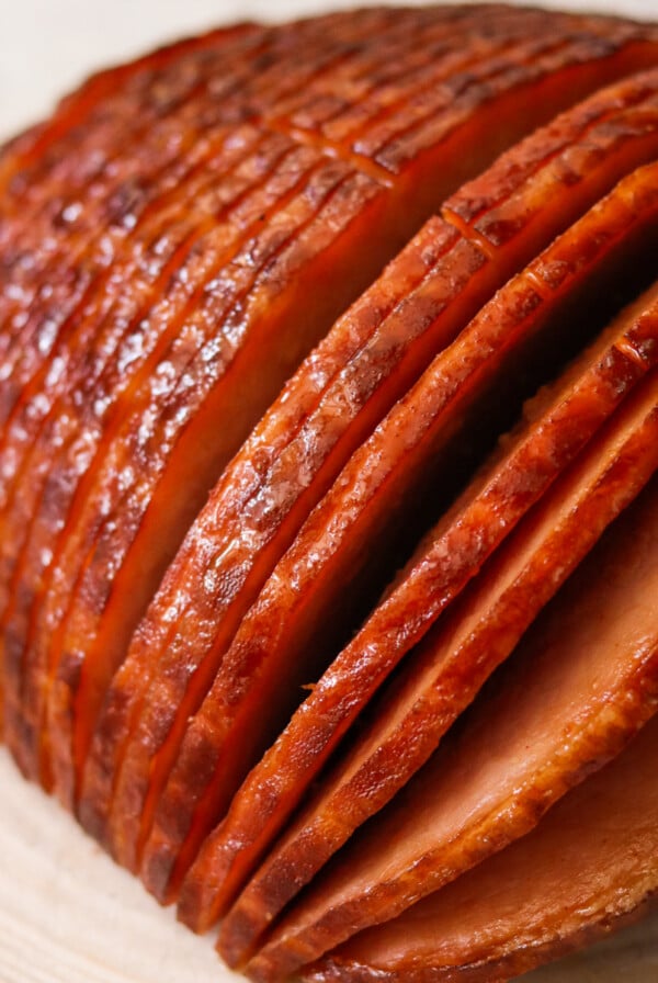 a close up view of a ham sliced after cooking