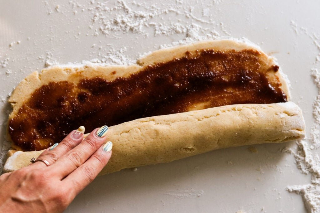 Rolling the dough into a log