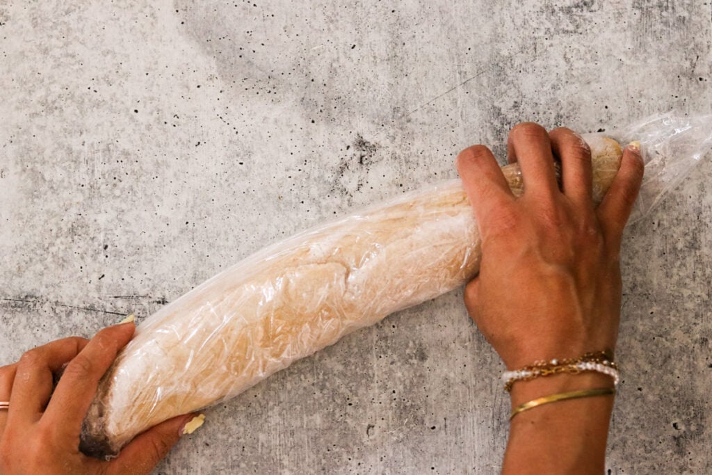 Wrapping dough log in a plastic wrap