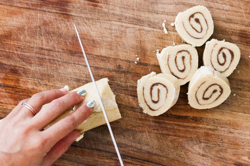Cutting dough log into half inch slices