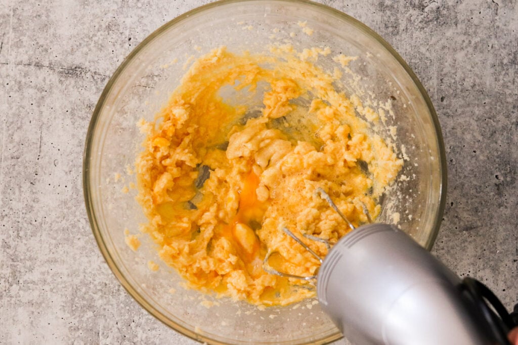Whisking together wet ingredients together with a hand mixer