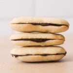 three milano cookies stacked on top of each other