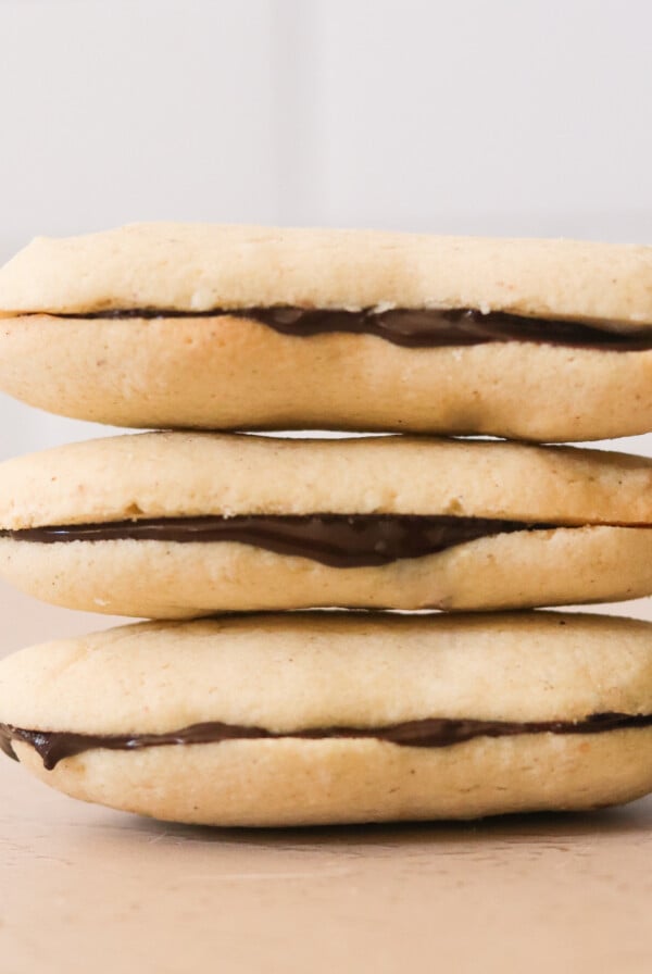 three milano cookies stacked on top of each other