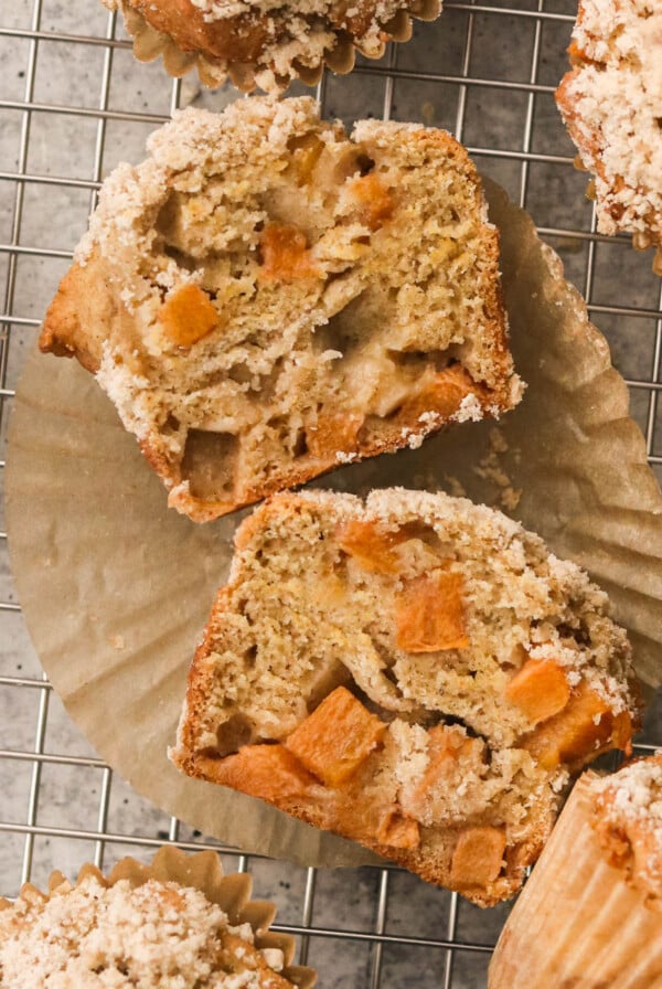 a close up of a persimmon muffin cut in half
