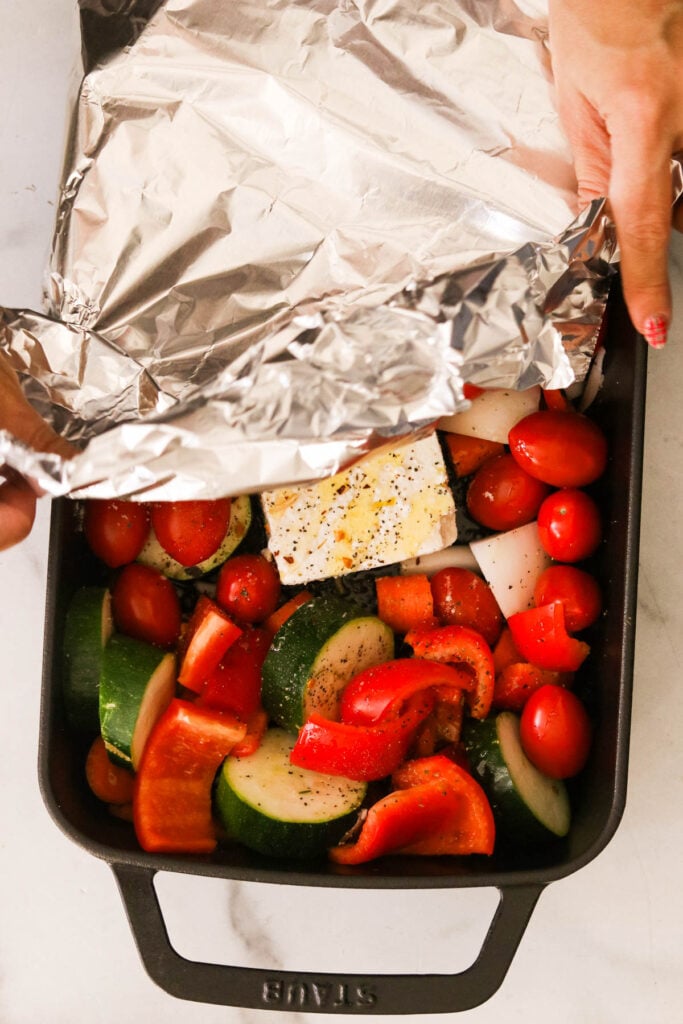 covering a baking pan with foil 