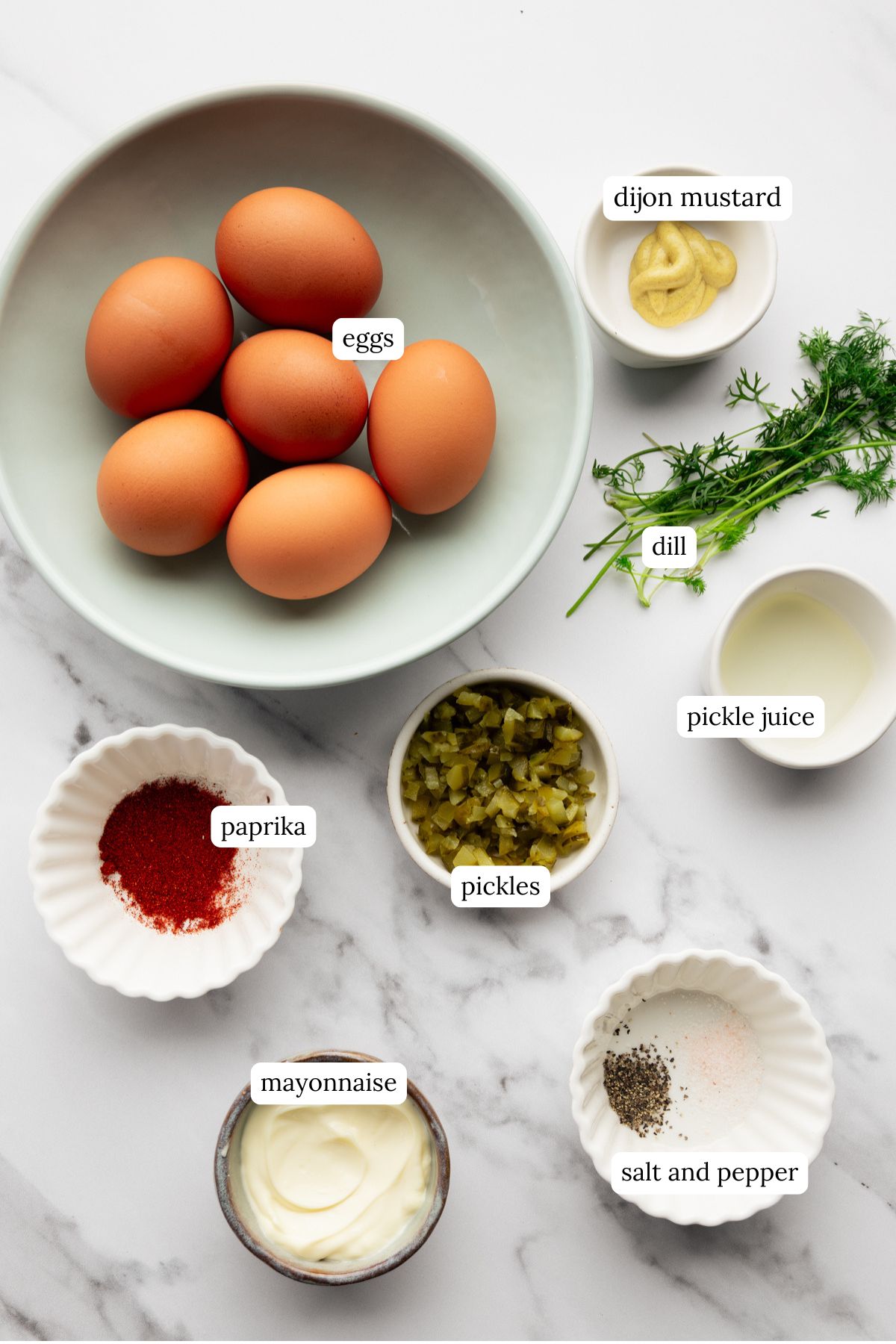 recipe ingredients in small bowls and labeled 