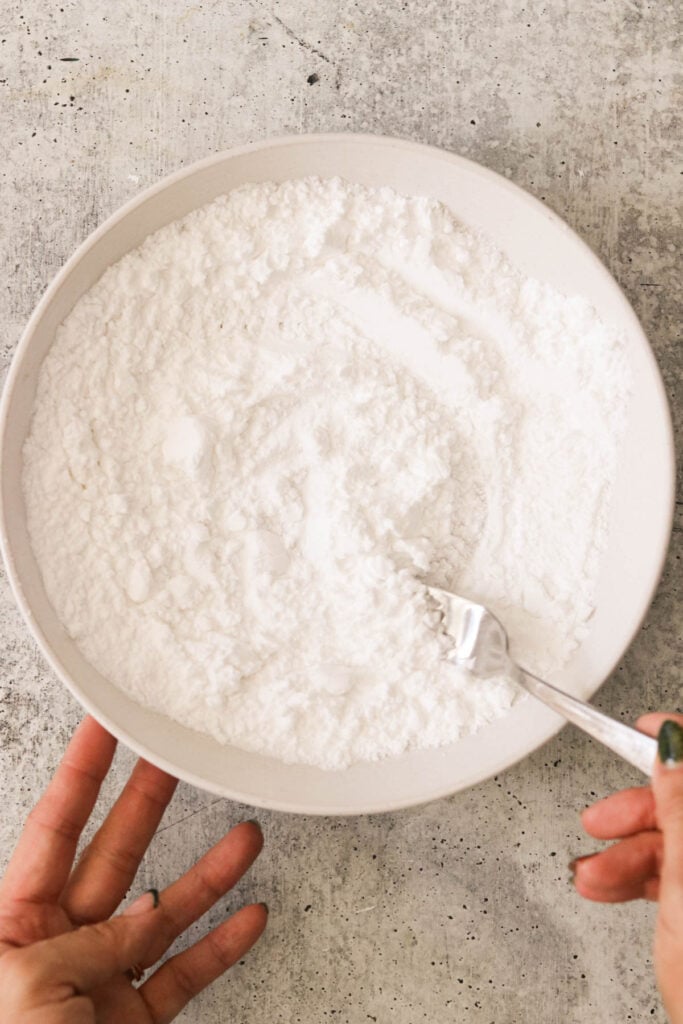 a bowl with salt and potato starch 