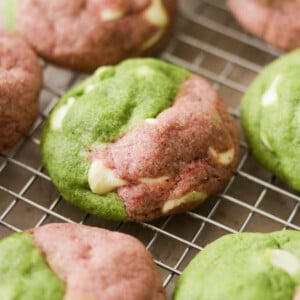 baked strawberry matcha cookies cooling on a wire rack