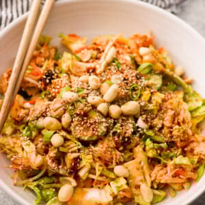 Overhead view of bang bang chicken salad in a bowl