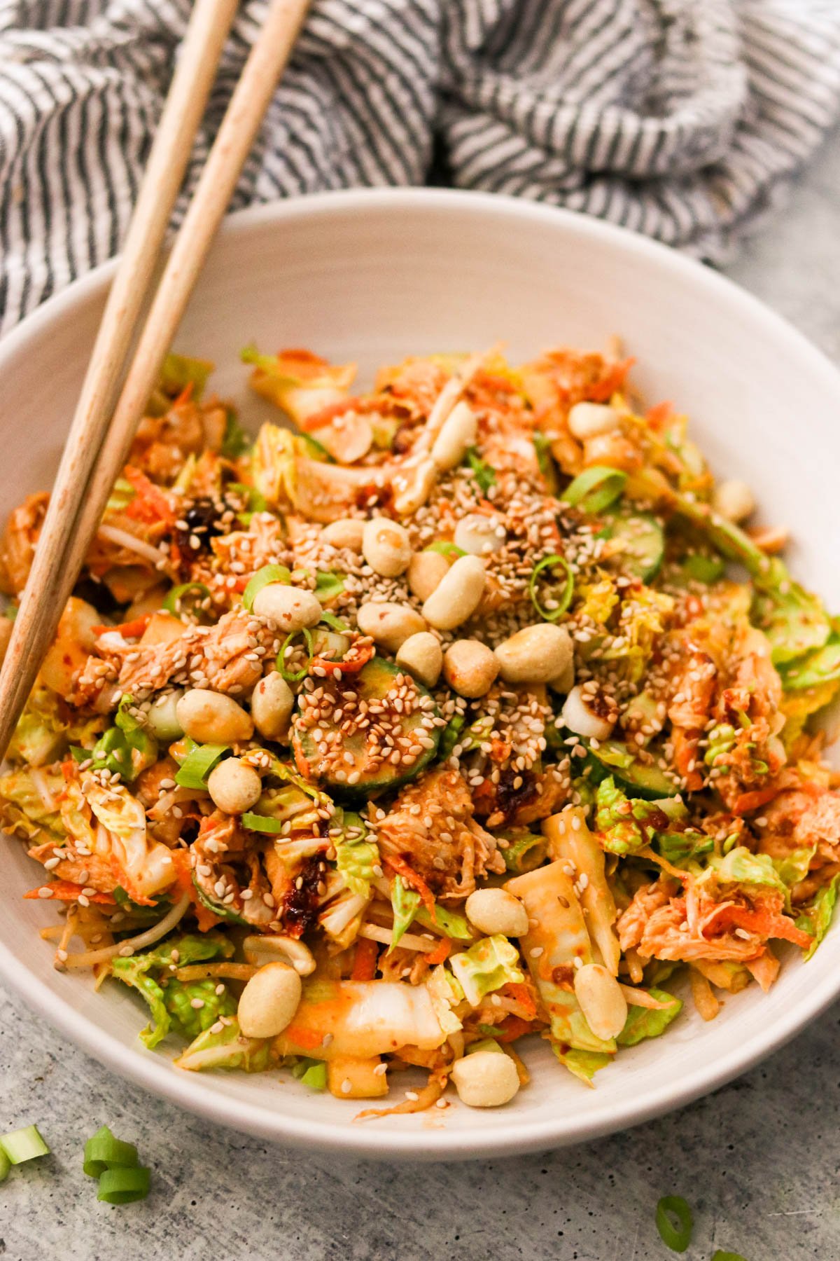 Overhead view of bang bang chicken salad in a bowl