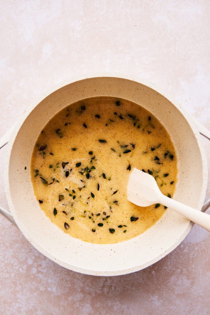 melted ghee in a white bowl