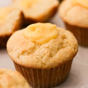 lemon curd muffins with creamy curd visible in the center