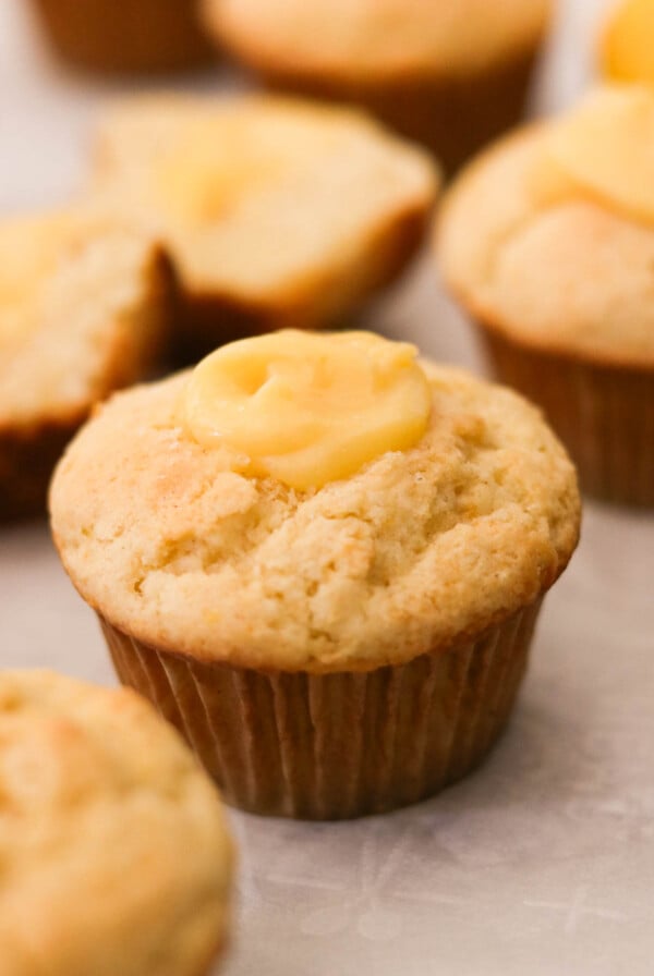 lemon curd muffins with creamy curd visible in the center