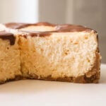 an easy cheesecake recipe sliced to show the creamy middle