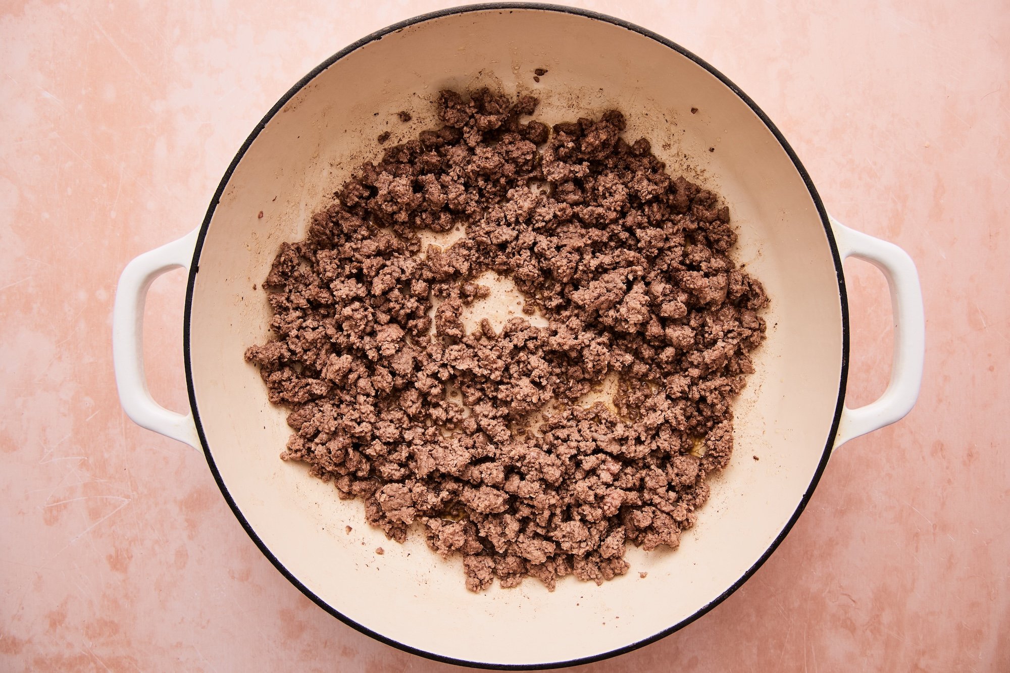 Browned beef in a large skillet.